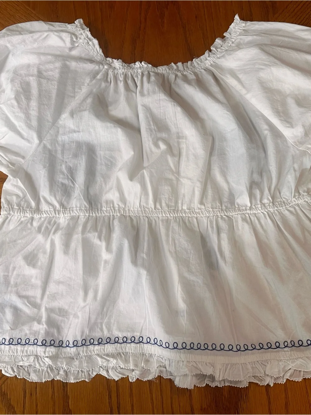 White Embroidered Peasant Top with Blue Floral Detailing